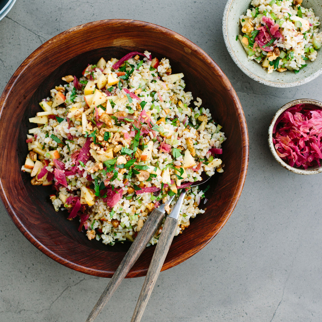 Brown rice salad with apple, celery, kraut + mustard seed dressing